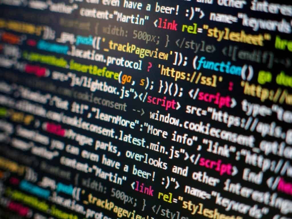 Source code displayed on a screen, representing how to write clear pull request descriptions that speed up code review