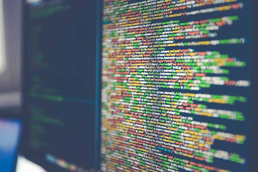 Close-up of programming code displayed on a computer monitor