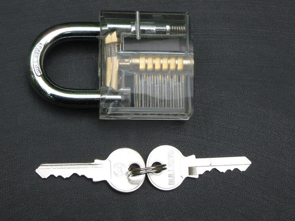 A clear padlock with keys symbolizing security controls, used to illustrate AI prompt injection defenses