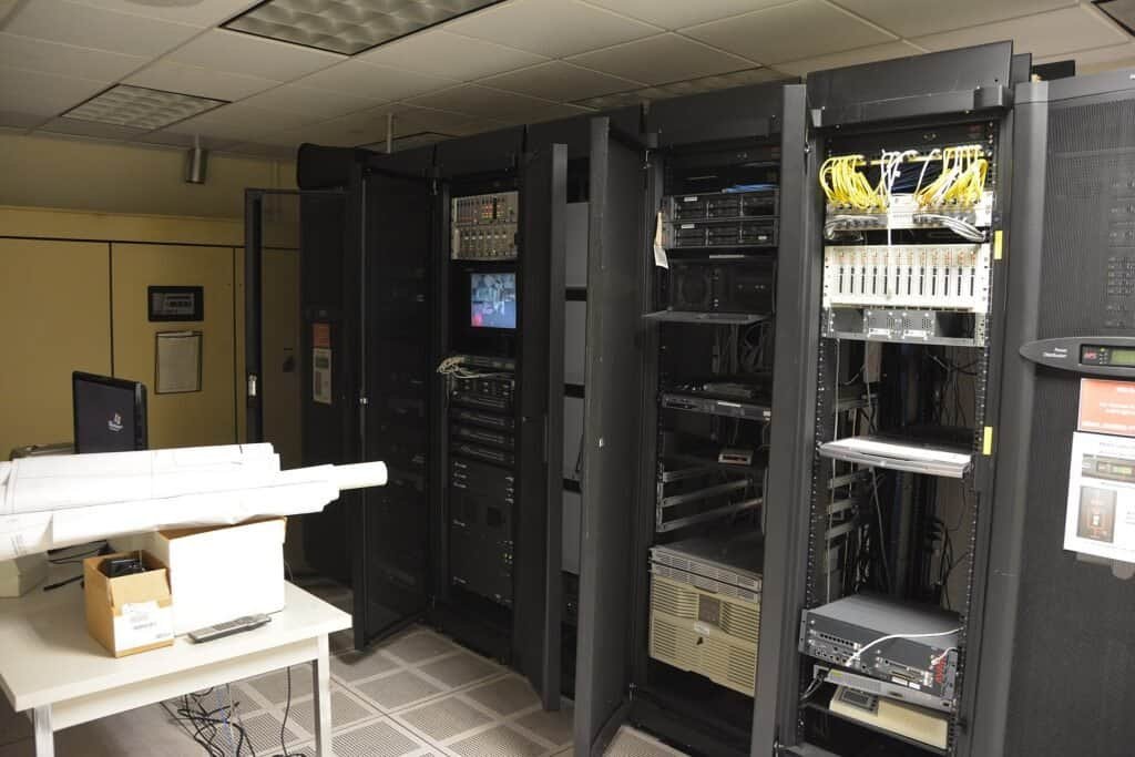 Rows of server racks in a data center