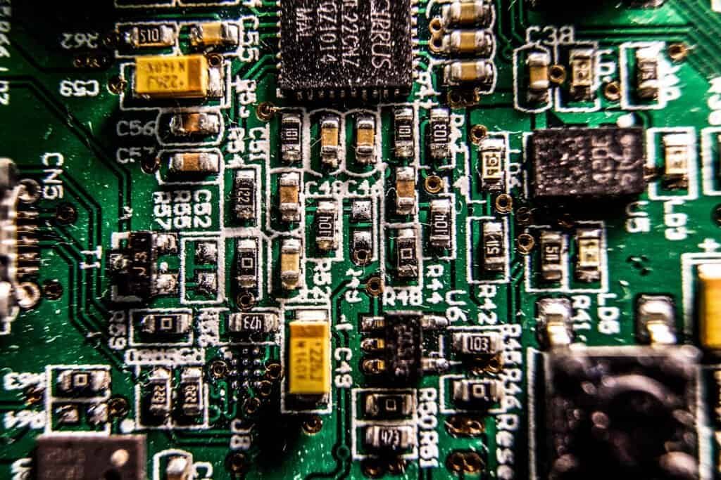 Macro photograph of a populated circuit board, representing the modular building blocks of an AI Skill