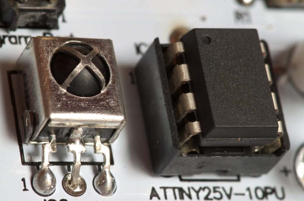 Close-up macro photograph of a soldered printed circuit board