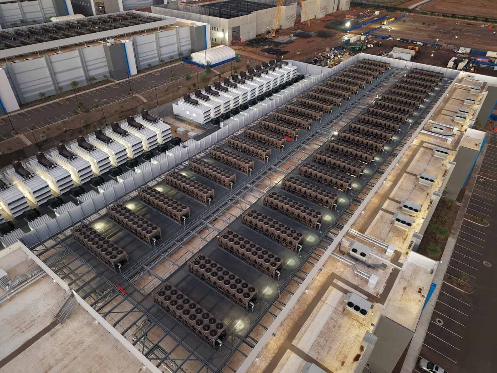 Aerial view of a data center roof lined with rows of cooling units