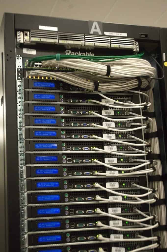 Close-up of server rack cabling, representing infrastructure automated by CI/CD pipelines