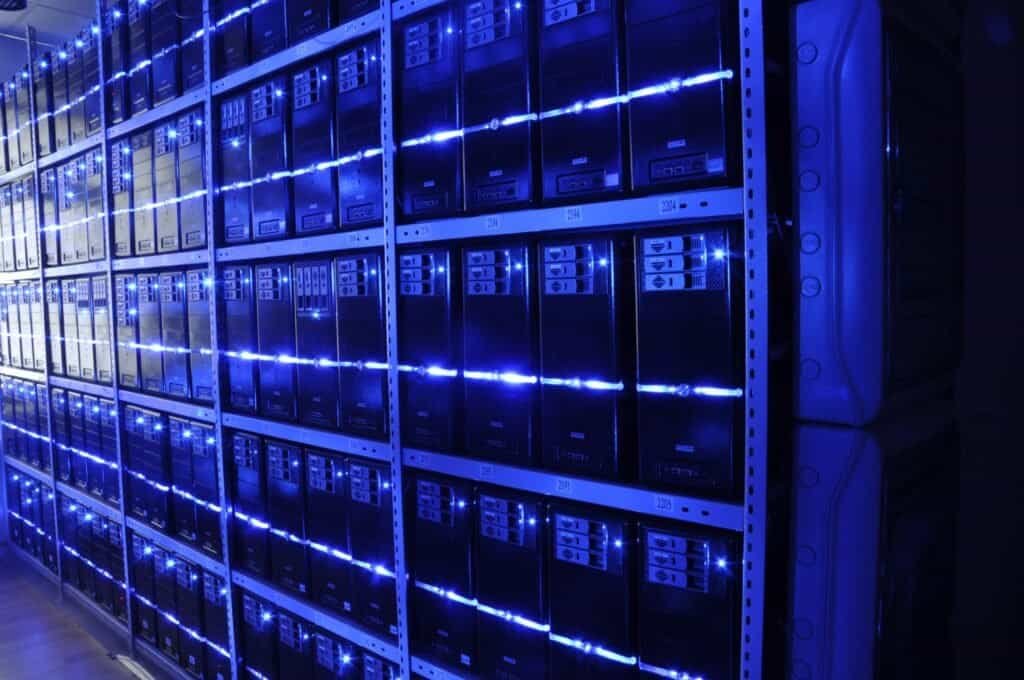 Rows of server racks in a data center, representing the backend infrastructure behind a site's sitemap cache